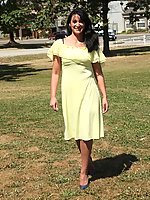 Mature in stockings lifts her skirt