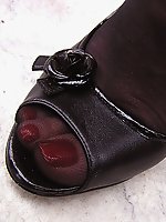 Mature lady flashing her feet in stockings in public