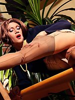 Kinky secretary in sexy underwear FF-stockings and high heels