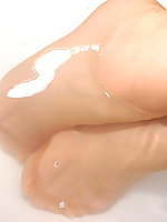 Blonde mature having a full bath in wet pantyhose layers