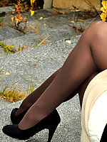 Mature posing outdoor in opaque pantyhose and heels