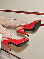 Amateur girl in stockings and high heels