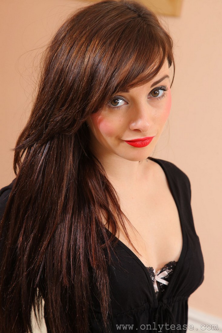 Redhead model in lingerie and stockings