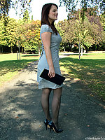 Dark blue stilettos go well with this babes blue dress and dark stockings.