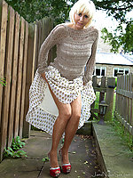 Naughty mature in heels and patterned pantyhose