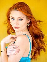 Redhead babe Lacy spreads wide and takes that big cock right by the water's edge